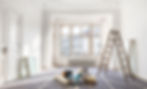 Bright, empty room with ornate ceiling, large windows, and a ladder. Paint supplies and tools are scattered on the floor, suggesting renovation.