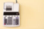 Beige background with a Canon MP20DHII calculator featuring a paper roll and colorful keys. Text includes brand and model details.